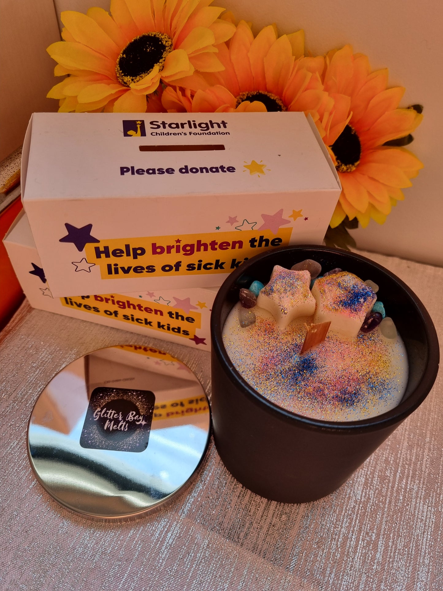 Large Black Candle with Silver Lid.