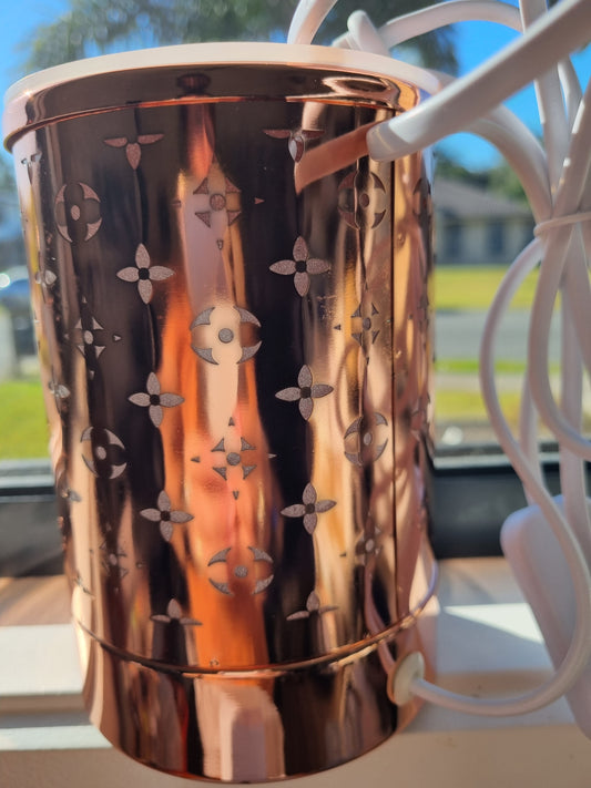 The Louie Rose Gold Electric Wax Warmer.